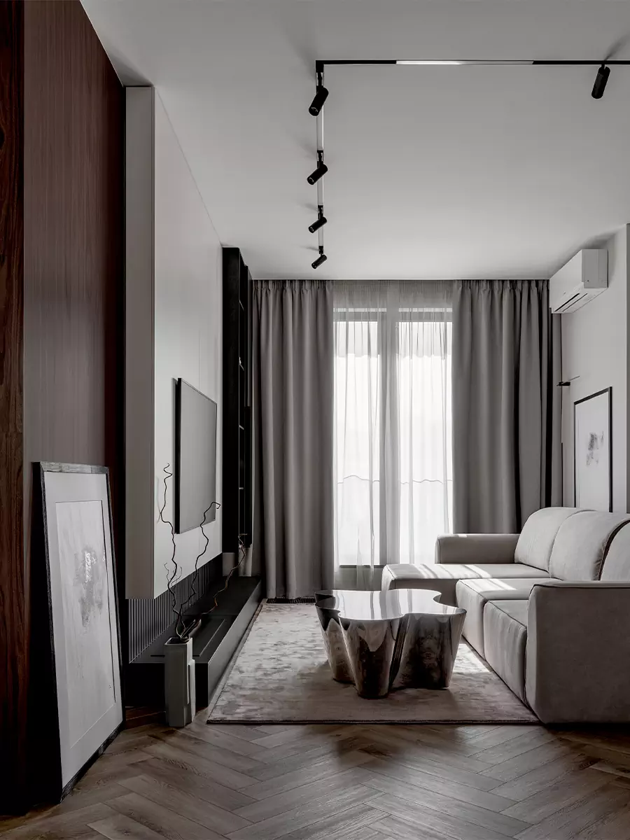Монохромный интерьер квартиры с эффектным камином в гостиной — проект Яны Родзевич