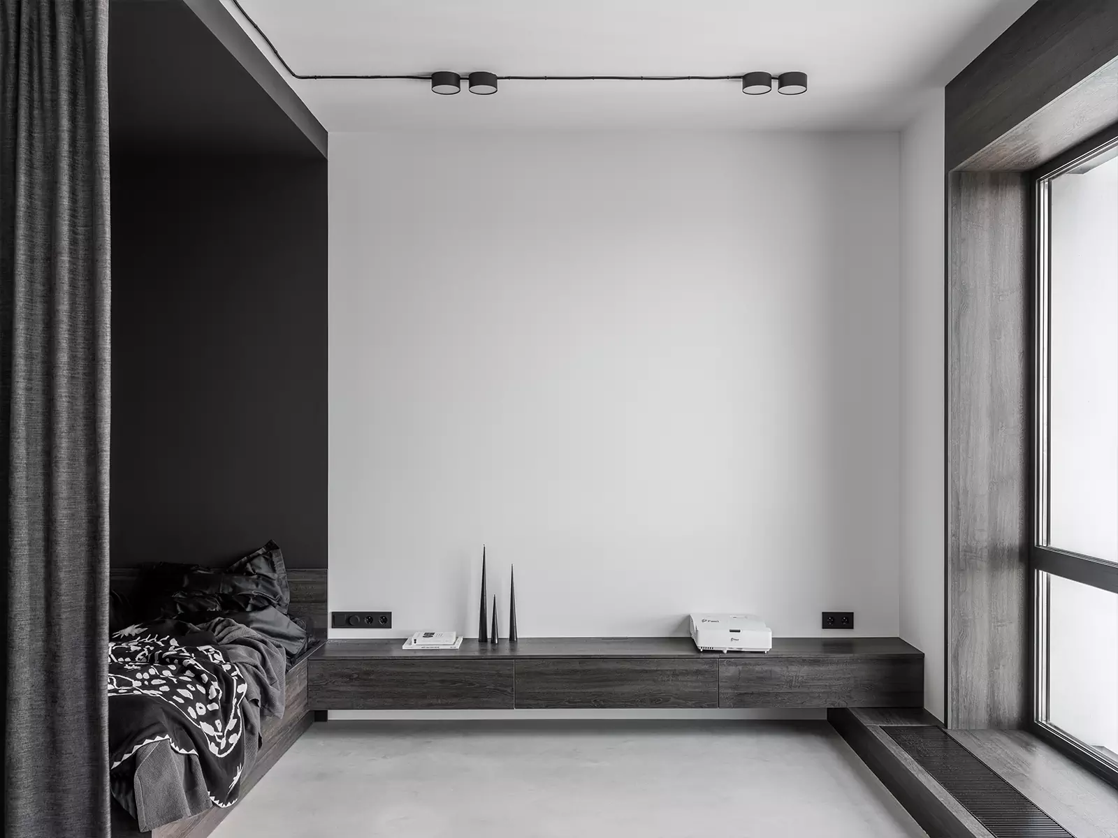 Монохромный интерьер квартиры-студии со строгим зонированием — проект BLOK Studio