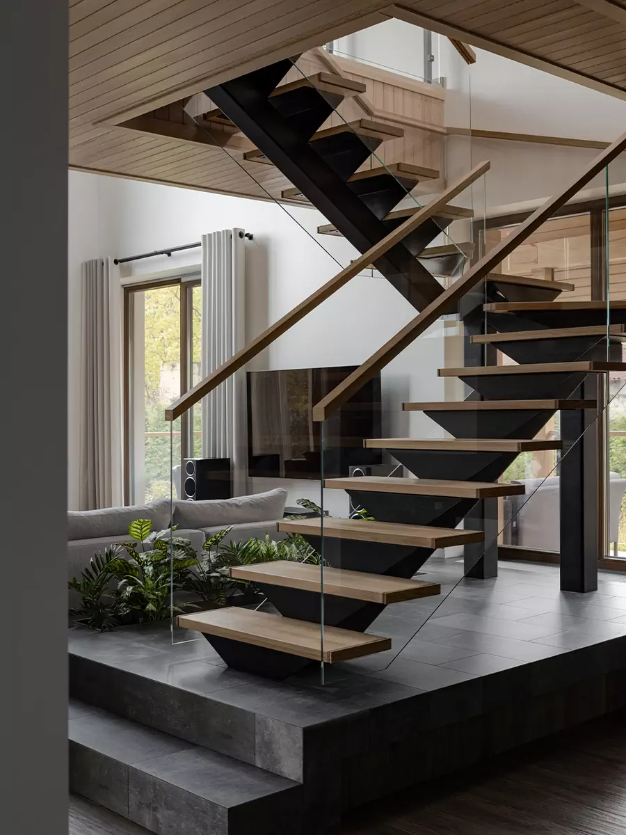 Воздушная лестница и микс теплых пород дерева в интерьере семейного дома в Беларуси — проект Игоря и Алёны Скаржевских