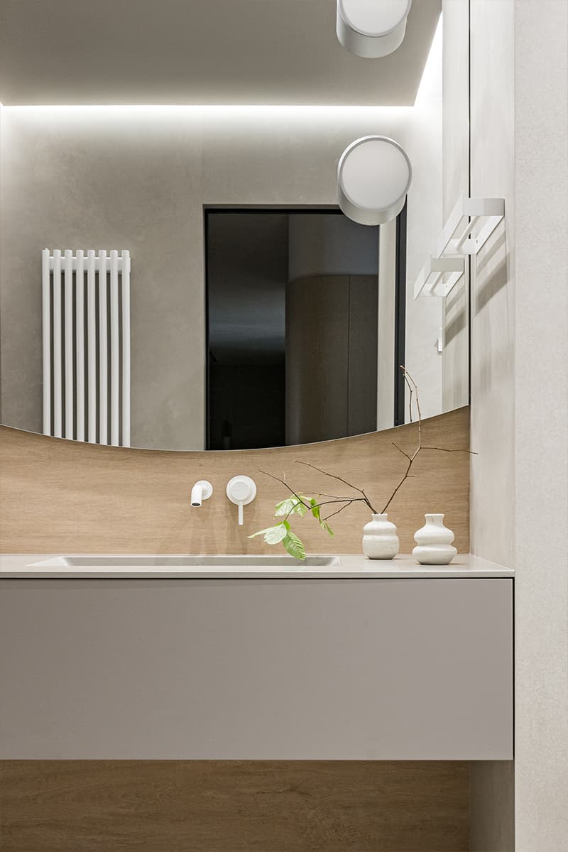 Элегантный куб гардеробной в центре интерьера с мягкими линиями — проект студии дизайна интерьеров Анастасии Безматерных