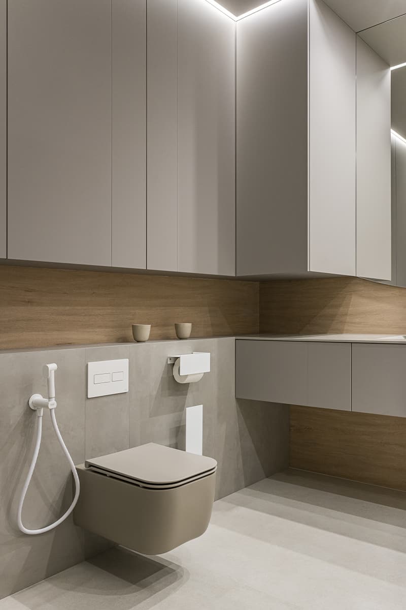 Элегантный куб гардеробной в центре интерьера с мягкими линиями — проект студии дизайна интерьеров Анастасии Безматерных