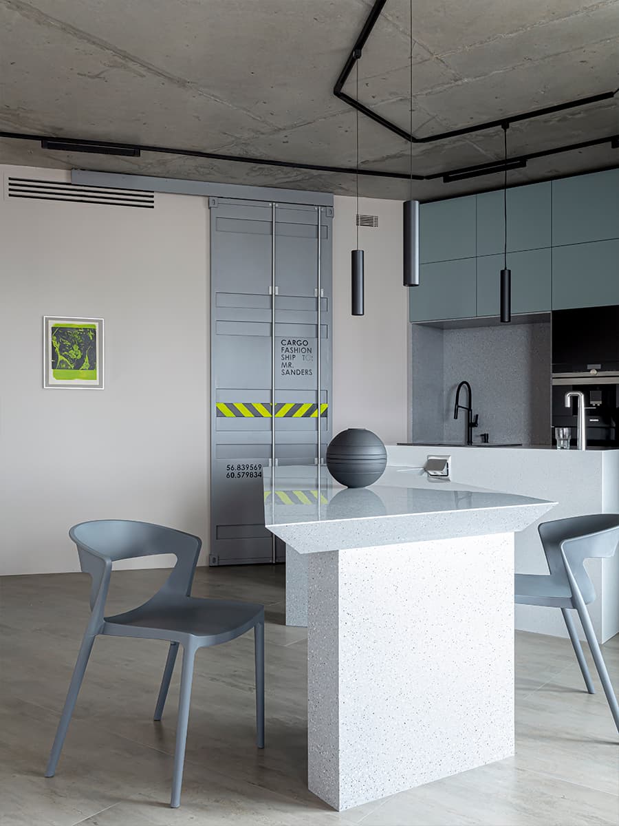 Бетонные потолки, кожа и индустриальные детали в интерьере квартиры для молодого человека — проект Ольги Коваленко