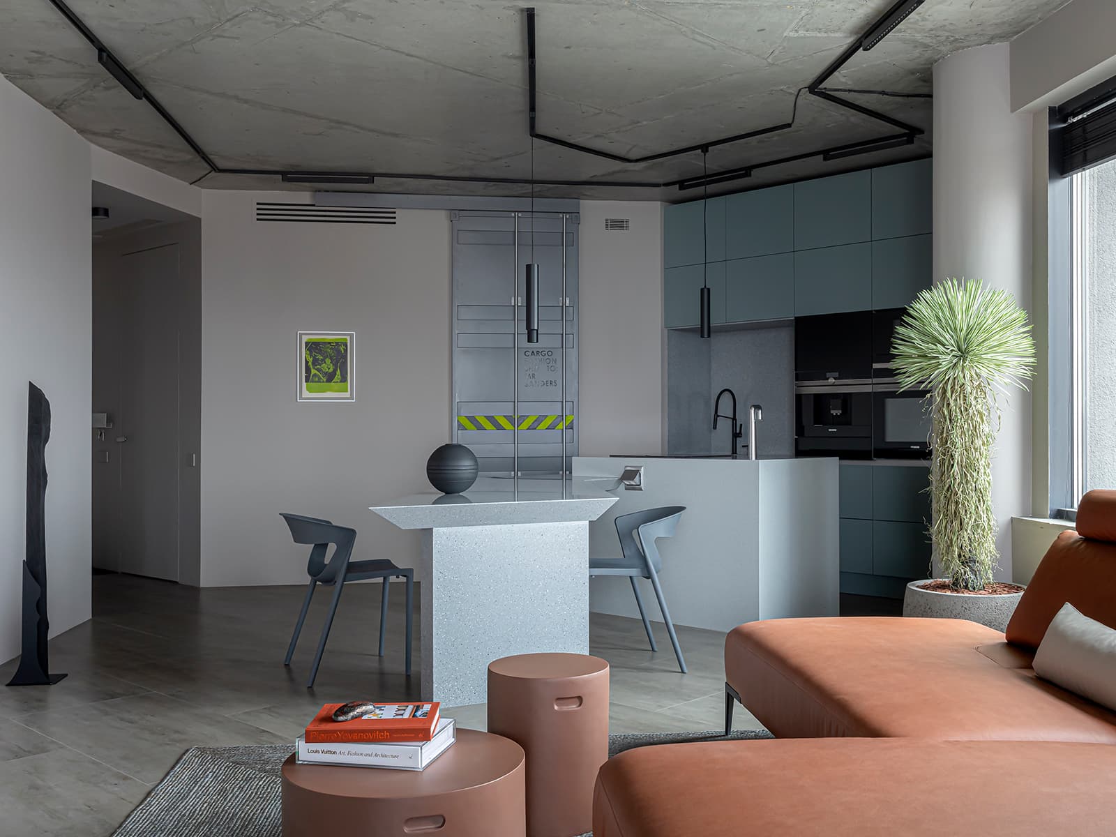 Бетонные потолки, кожа и индустриальные детали в интерьере квартиры для молодого человека — проект Ольги Коваленко