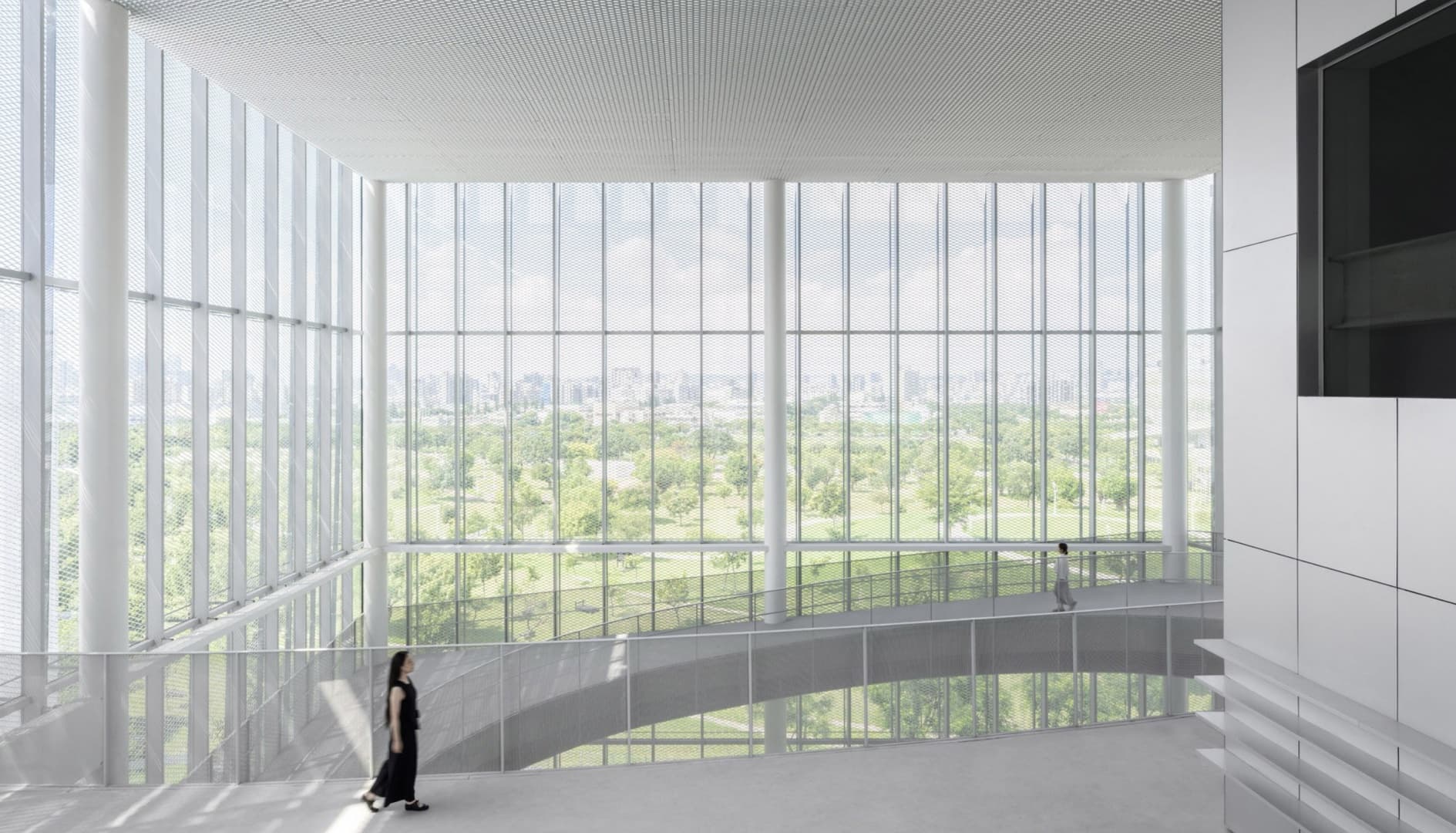 Студия SANAA построила музей-библиотеку на Тайване Студия SANAA построила музей-библиотеку на Тайване