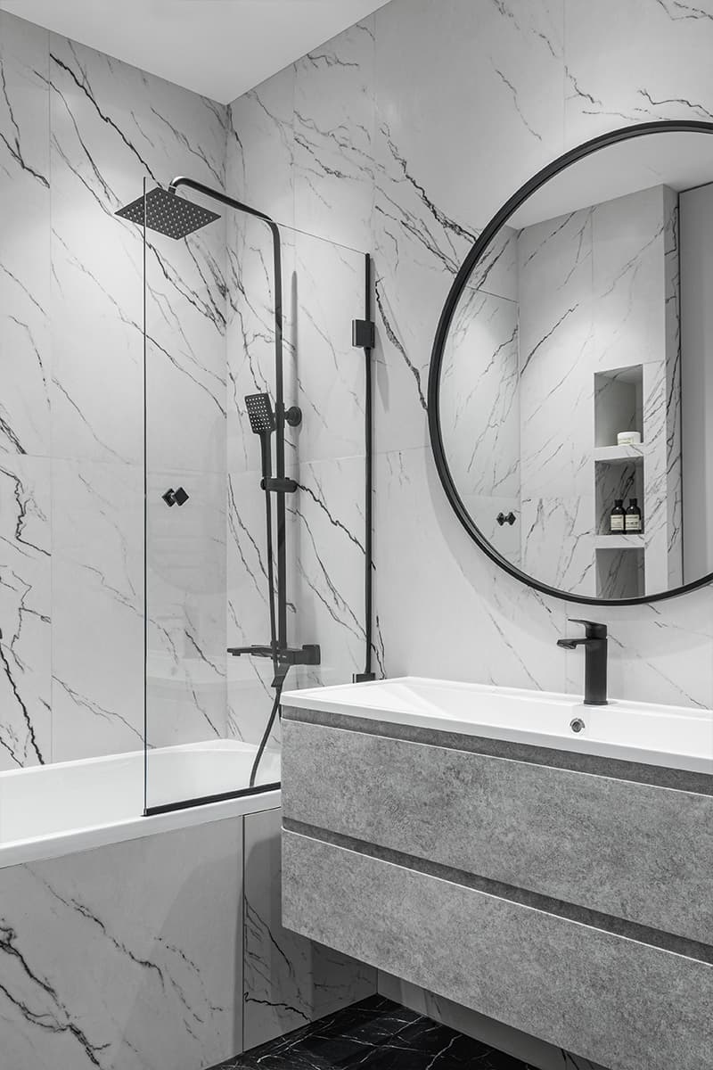 Базовая серая палитра и точечные акценты в интерьере квартиры для сдачи в аренду — проект студии «Точка дизайна»