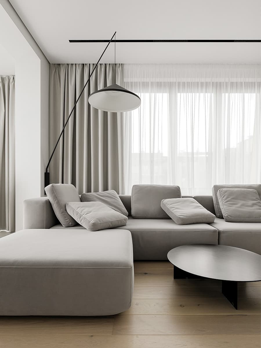 Монохромный интерьер квартиры с созданной на заказ мягкой группой — проект Станислава Бороздинского