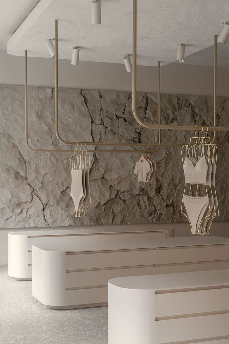 Скамьи-валуны и панно из искусственного камня в интерьере магазина на Патриарших прудах — проект бюро Gulyaev + Tsakharias